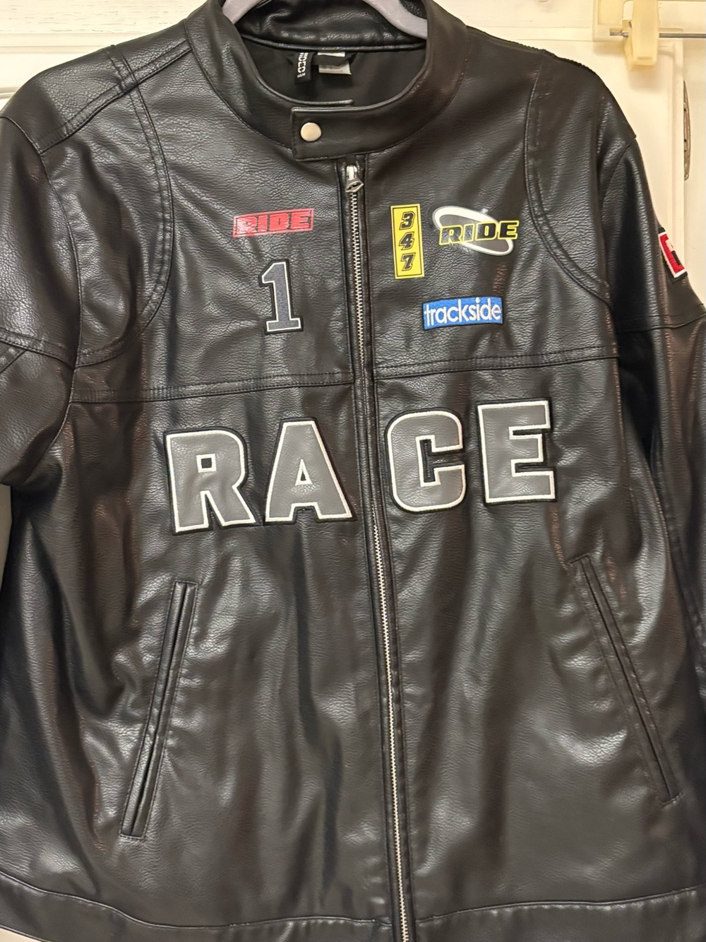 Divided Black Faux Leather Moto Jacket with Racing Patches